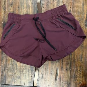 Plum Fierce Zipper Pocket Shorts  size Xlg
(Run small)